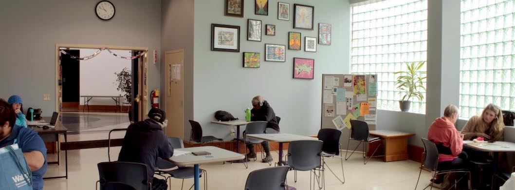 Patrons working in library lounge