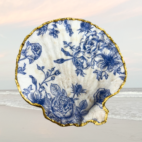 image of seashell with a blue and white floral pattern on it